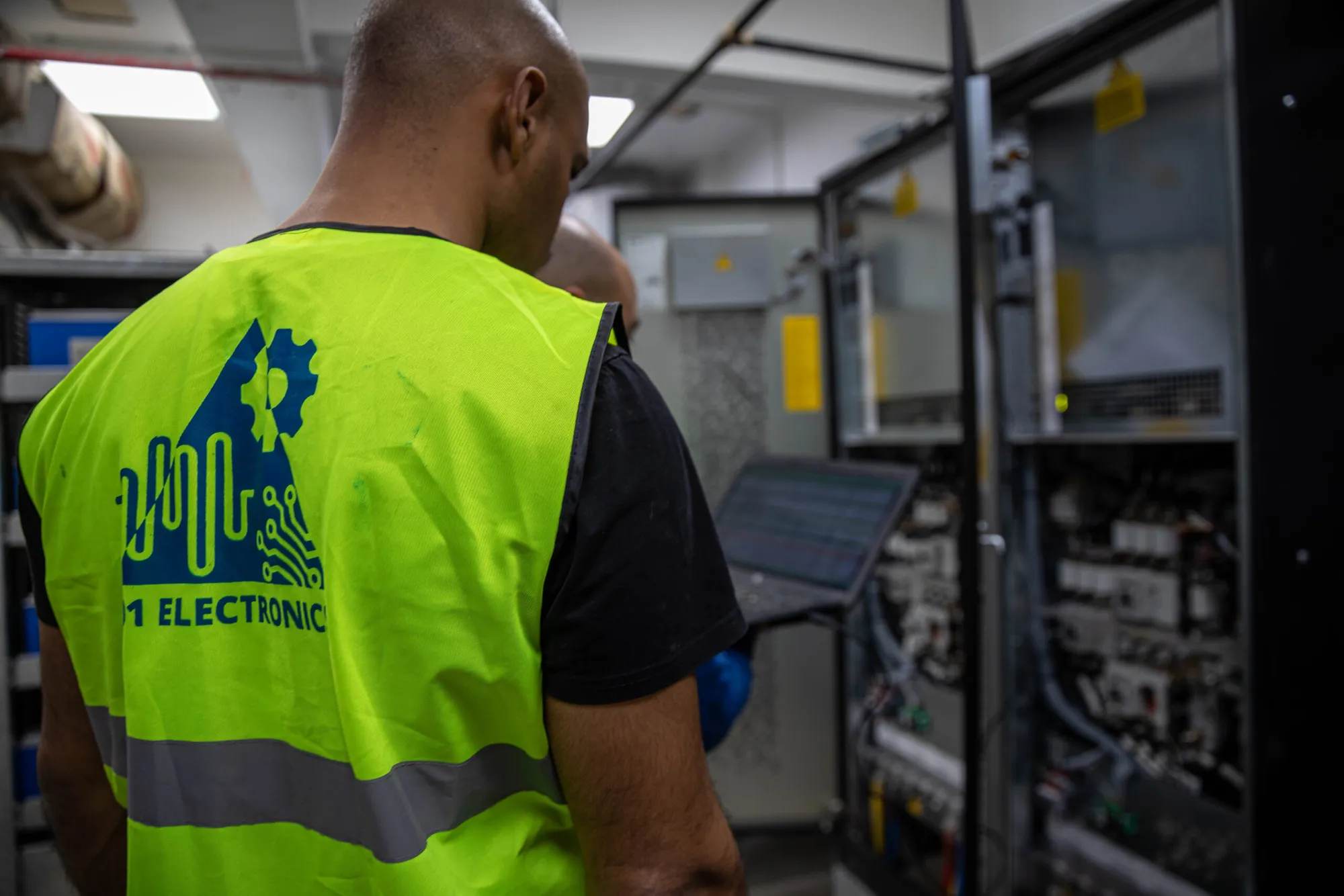 01 Electronics engineer commissioning a UPS system on site