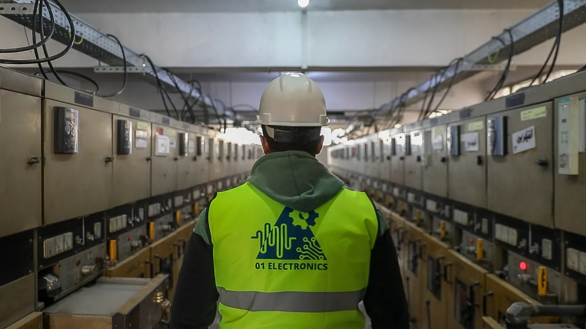 01 Electronics engineer in a power station switchgear room